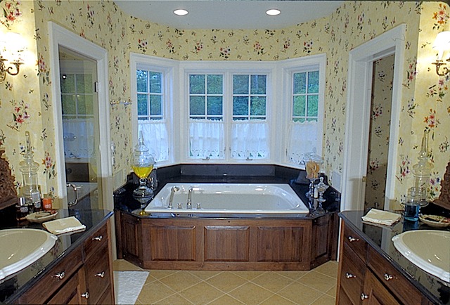 walnut vanities and tub surround