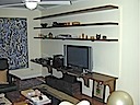 open walnut shelving